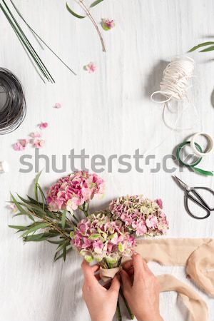 The florist desktop with working tools and ribbons Stock photo © master1305