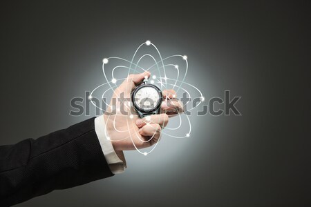 hand holding a stopwatch against a white background Stock photo © master1305