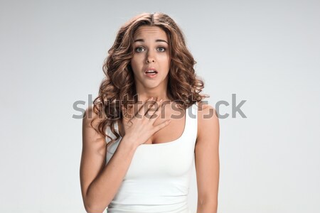 Secret woman. Female showing hand silence sign  Stock photo © master1305