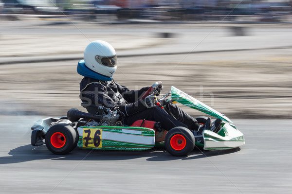 Karting - driver in helmet on kart circuit Stock photo © master1305