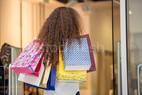 beautiful young woman with a shopping bags in the mall Stock photo © master1305