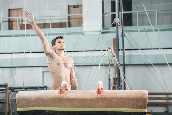 Stock photo: The sportsman before difficult exercise, sports gymnastics
