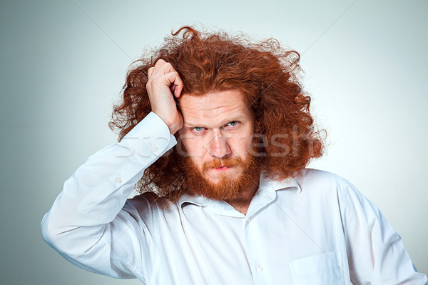 Stressed businessman with a headache Stock photo © master1305