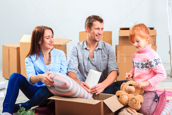 The happy family  during repair and relocation Stock photo © master1305