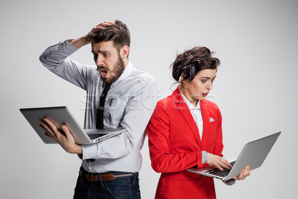 Stock foto: Jungen · Geschäftsmann · Geschäftsfrau · Laptops · kommunizieren · grau