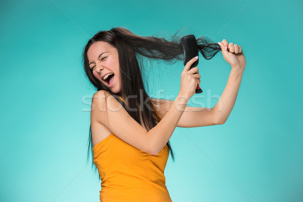 Frustrated young woman having a bad hair Stock photo © master1305