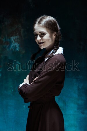 Porträt jungen lächelnd Mädchen Schuluniform Killer Stock foto © master1305