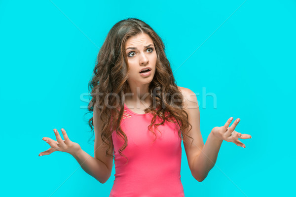 Stock photo: The portrait of disgusted and perturbed woman