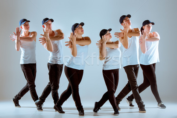 Group of men and women dancing hip hop choreography Stock photo © master1305