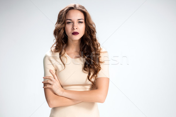 The strong girl or woman on gray background Stock photo © master1305