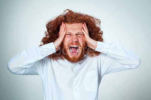 Stressed businessman with a headache Stock photo © master1305