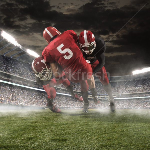 Stock photo: The american football players in action