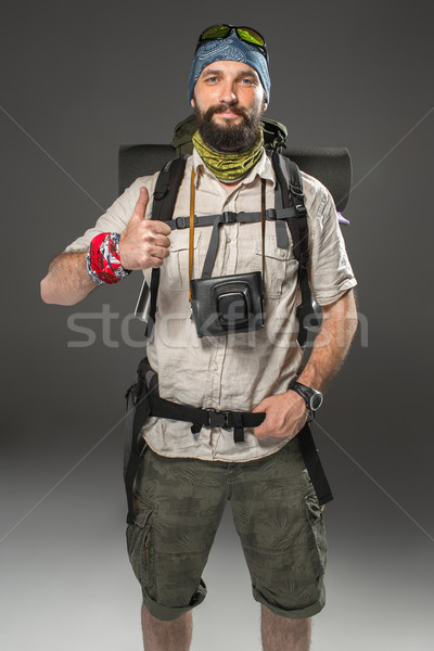 Portrait of a smiling male fully equipped tourist  Stock photo © master1305