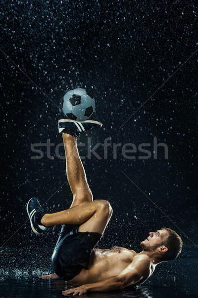 Water drops around football player under water Stock photo © master1305