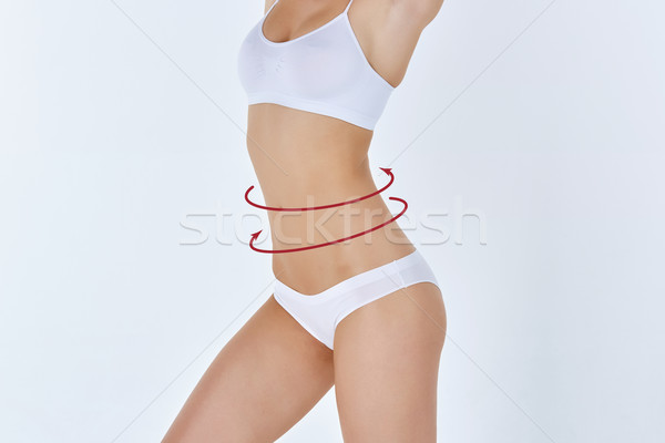 Body correction with the help of plastic surgery on white background, side view Stock photo © master1305