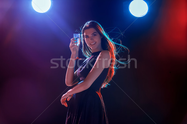 Gyönyörű lány tánc buli iszik pezsgő ünnepek Stock fotó © master1305