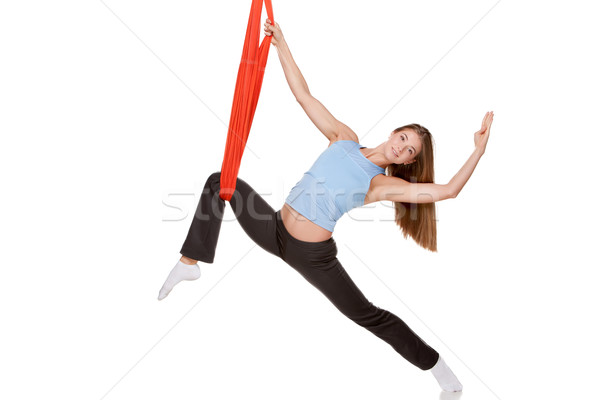 Young woman doing anti-gravity aerial yoga Stock photo © master1305