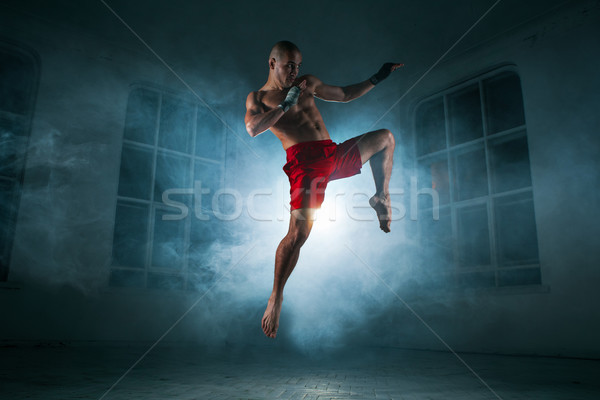 Imagine de stoc: Tânăr · kickboxing · albastru · fum · tineri · masculin