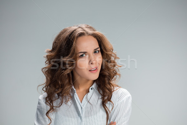 Portré fiatal nő megrémült arckifejezés szürke üzlet Stock fotó © master1305