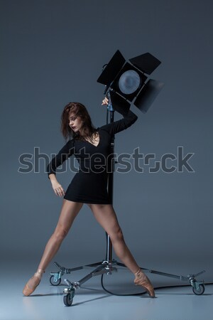 The beautiful ballerina posing on dack blue background   Stock photo © master1305