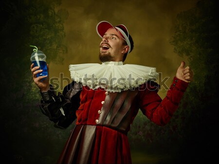 The scary clown holding a knife on dack. Halloween concept Stock photo © master1305
