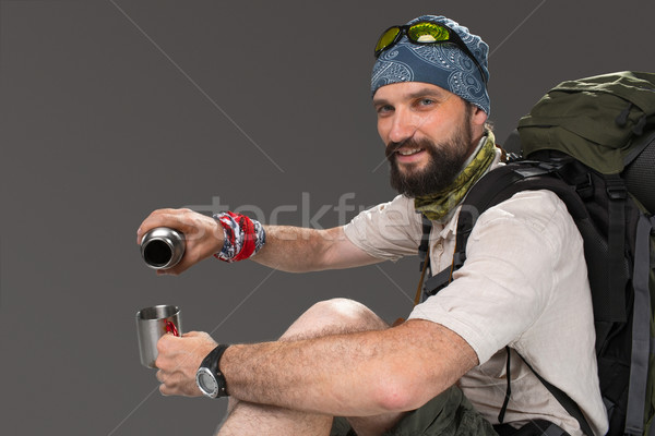 Portrait of a smiling male fully equipped tourist  Stock photo © master1305