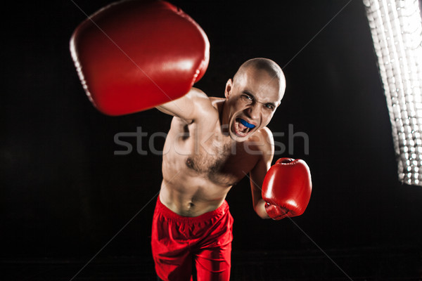 Jeune homme kickboxing noir bouche jeunes Homme Photo stock © master1305