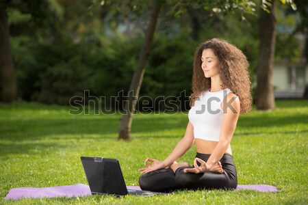 Csinos nő jóga meditáció ül park lótusz Stock fotó © master1305