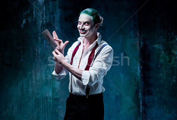 Bloody Halloween theme: crazy joker face Stock photo © master1305