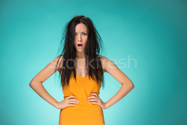 Csalódott fiatal nő rossz haj kék arc Stock fotó © master1305