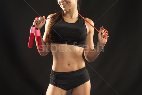 [[stock_photo]]: Musculaire · jeune · femme · athlète · corde · noir · regarder