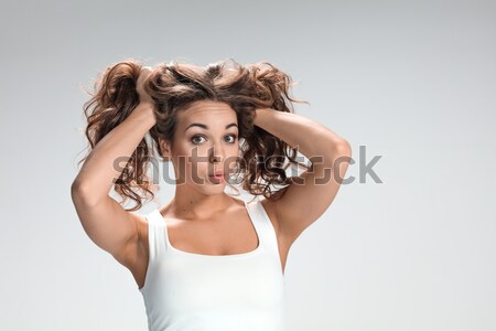 [[stock_photo]]: Femme · cheveux · vent · gris · visage