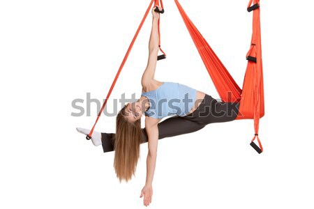 Young woman making antigravity yoga exercises in stretching twine Stock photo © master1305