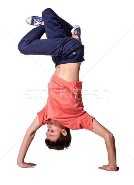 Break dancer doing handstand against  white background Stock photo © master1305