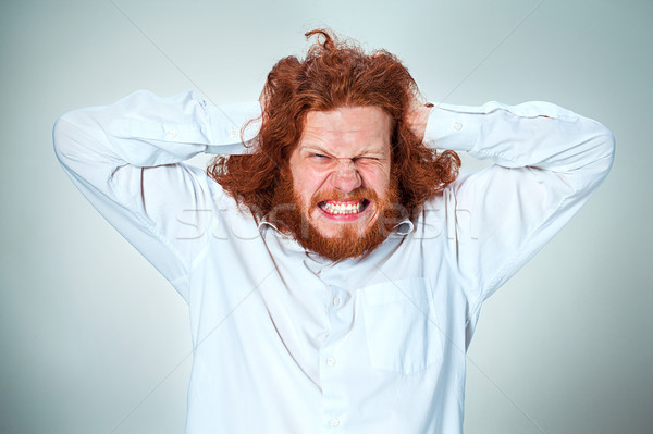 Stressed businessman with a headache Stock photo © master1305