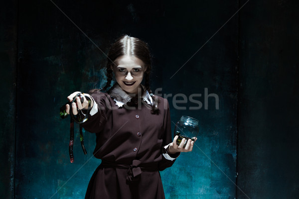 Stock photo: The Halloween theme: crazy girl with snakes