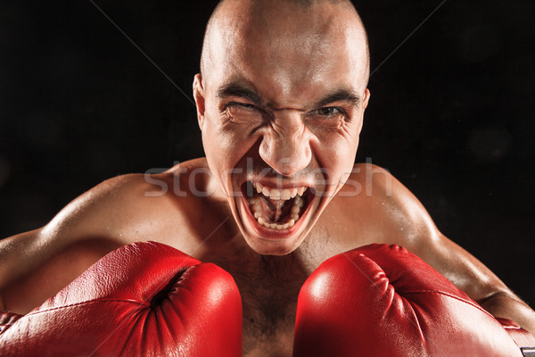 Młody człowiek kickboxing czarny krzyczeć twarz młodych Zdjęcia stock © master1305