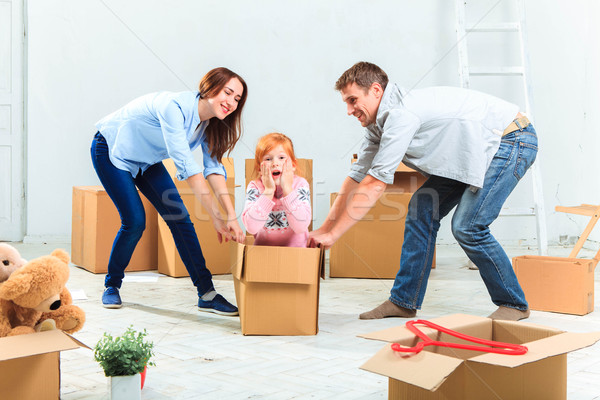 The happy family  during repair and relocation Stock photo © master1305