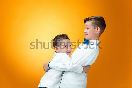 Zwei Jungen mit Laptop orange wenig Familie Stock foto © master1305