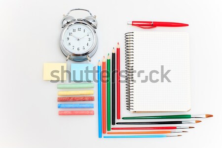 School set with notebooks, pencils, brush, scissors and apple on white background Stock photo © master1305