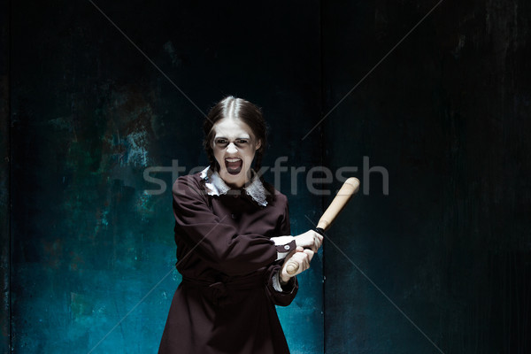 Portré fiatal lány iskolai egyenruha gyilkos nő portré nő Stock fotó © master1305