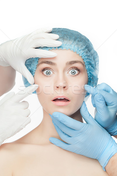 Plastik cerrahi doktor eller eldiven dokunmak kadın yüzü Stok fotoğraf © master1305