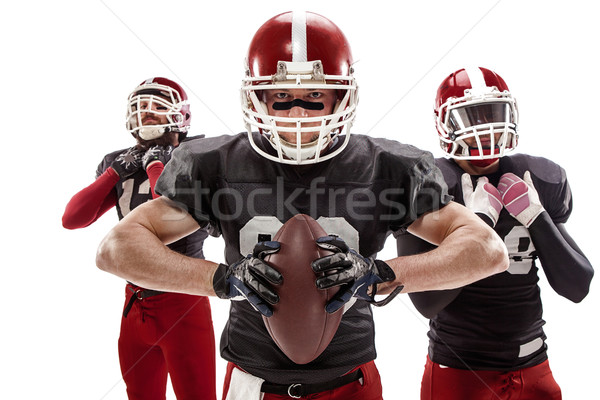 Trois football joueurs posant balle [[stock_photo]] © master1305