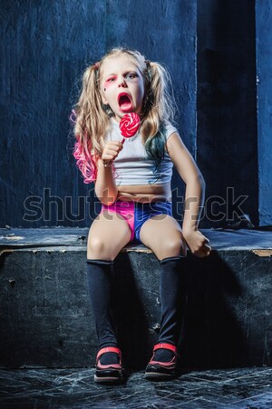 Little girl pointing in toy gun Stock photo © master1305
