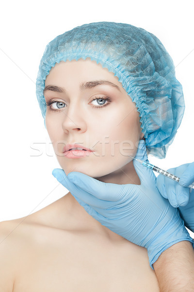 Plastik cerrahi şırınga yüz beyaz el Stok fotoğraf © master1305