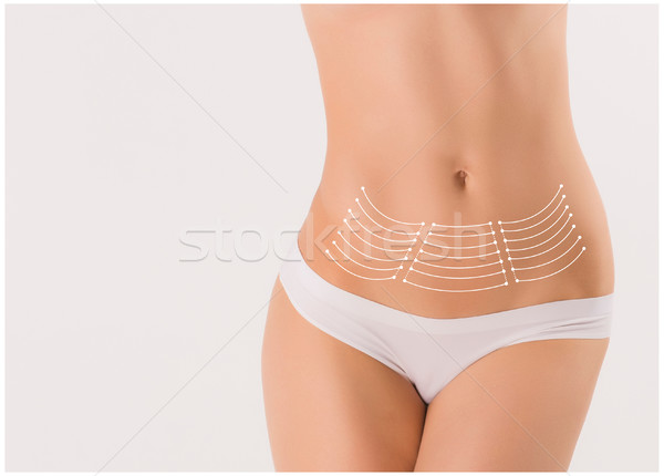Female body with the drawing arrows on white. Stock photo © master1305