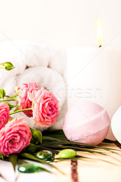 Stock photo: Spa setting with pink roses and aroma oil, vintage style 