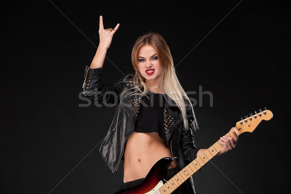 Beautiful girl playing guitar Stock photo © master1305