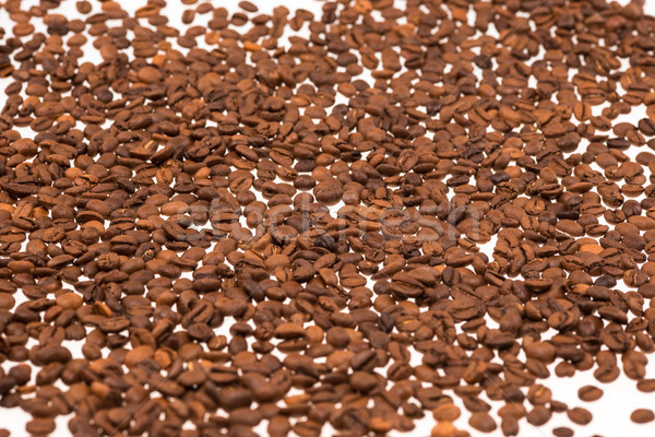 Black coffee beans on white table, Stock photo © master1305