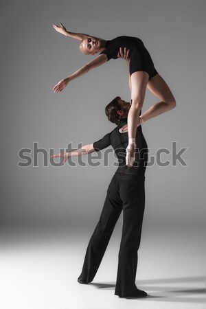 two young modern ballet dancers on gray studio background  Stock photo © master1305